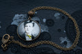 Collier bronze verso aux motifs fleurs en relief bijou littéraire poème " MAUVAIS SANG" Collection : une saison en enfer
