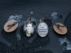 Boucles d'oreilles bronze ovales "ADIEU". Collection une saison en enfer